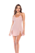 A timeless sleep chemise in a soft ribbed fabric. Features adjustable straps, side slits with satin bow details and semi-loose silhouette.