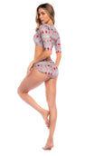 Enjoy the holidays in this Christmas print two-piece set. Fitted silhouette.